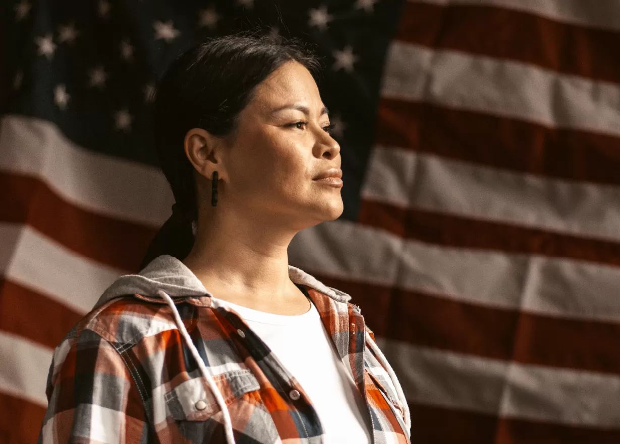 Woman portrait with the united states flag on the background